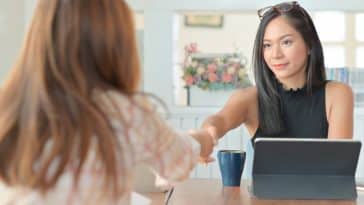 young businesswoman handshake congratulations afte 2021 08 27 11 27 17 utc