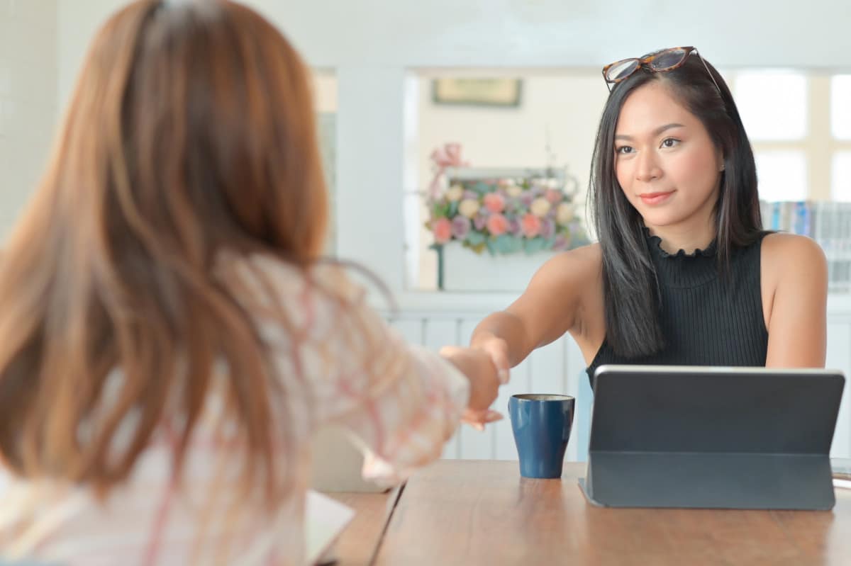 young businesswoman handshake congratulations afte 2021 08 27 11 27 17 utc